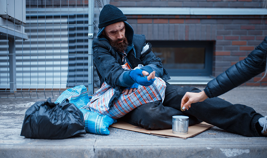 male-bearded-beggar-begging-on-city-street-WJAW8HK